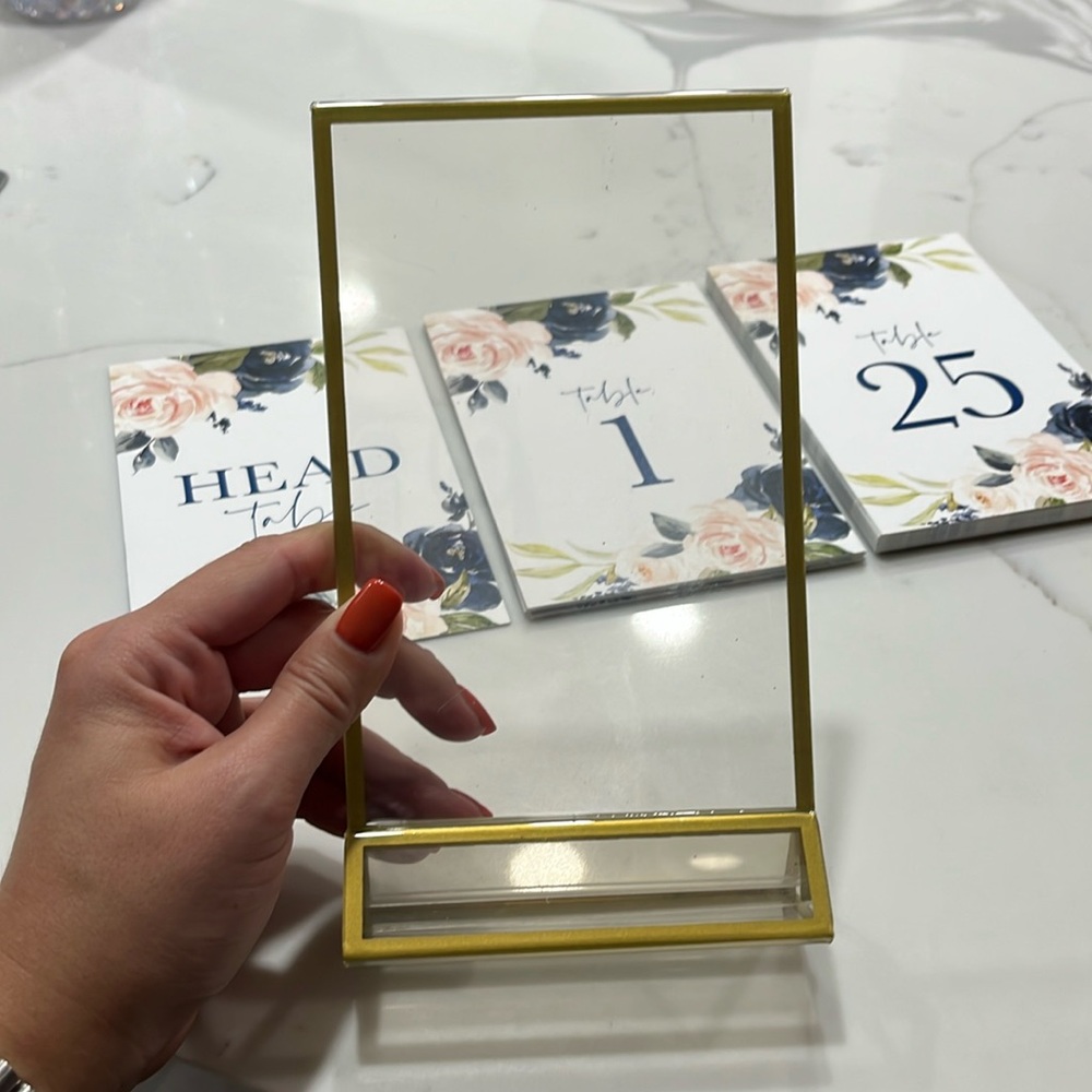 Gold table number frame holders